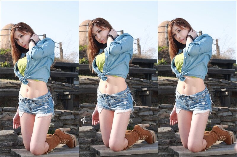 woman in denim outfit kneeling