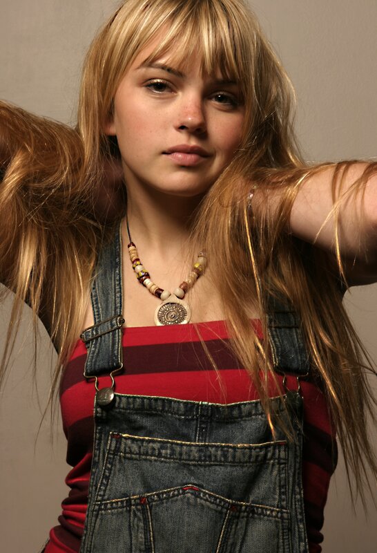 woman in denim overalls