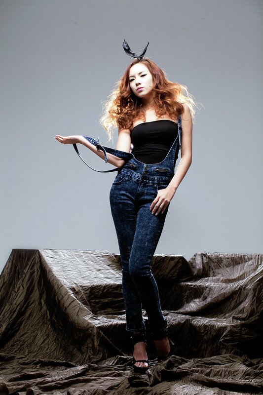 woman in denim overalls