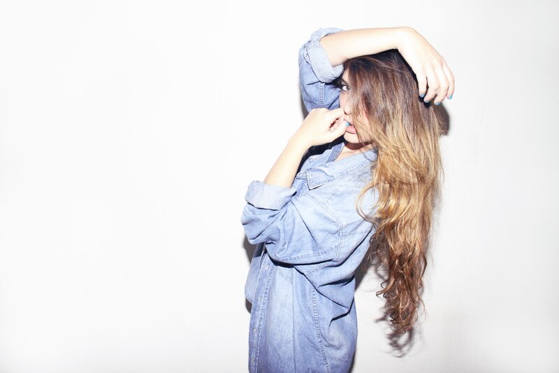 woman in denim shirt