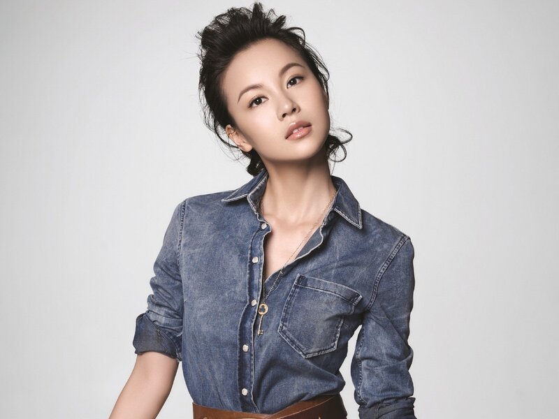 woman in denim shirt