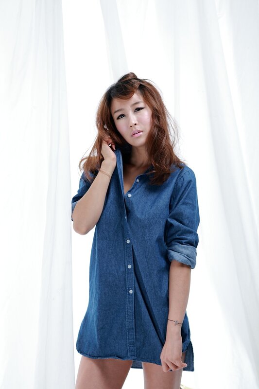 woman in denim shirt