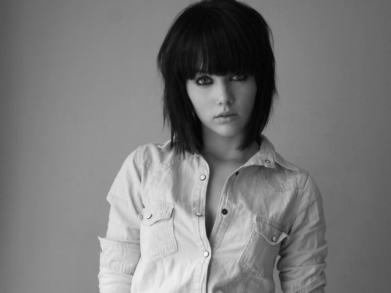 woman in denim shirt