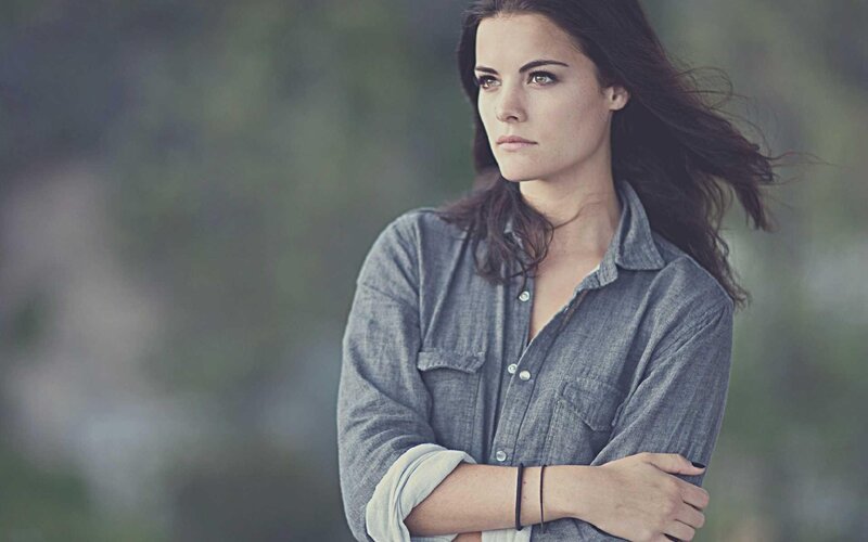 woman in denim shirt