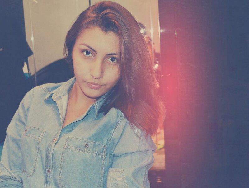 woman in denim shirt