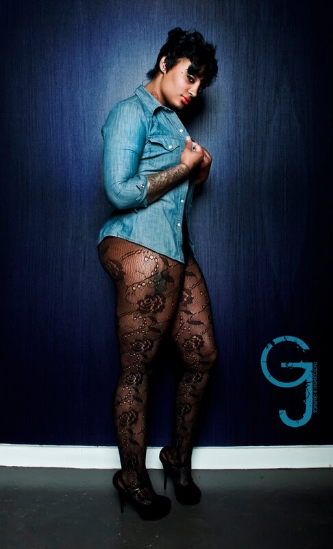 woman in denim shirt and lace tights