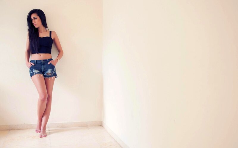 woman in denim shorts