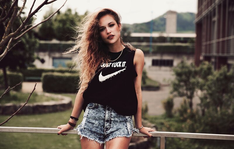 woman in denim shorts