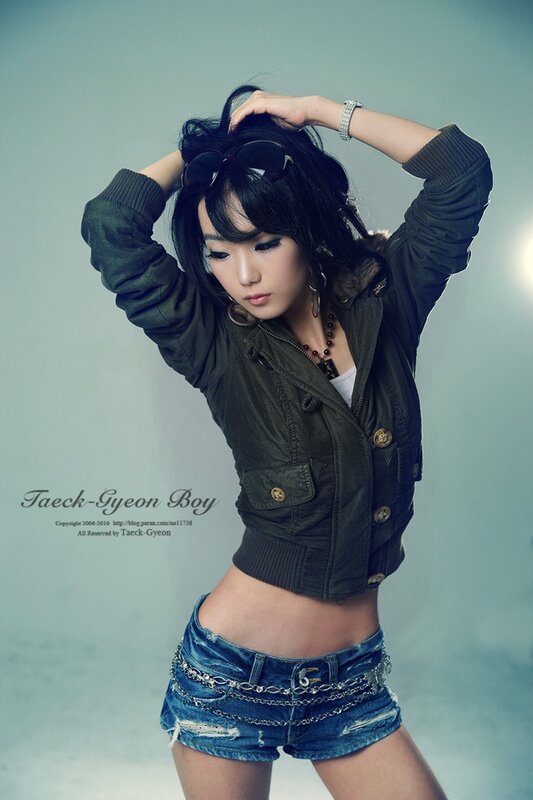 woman in denim shorts and jacket