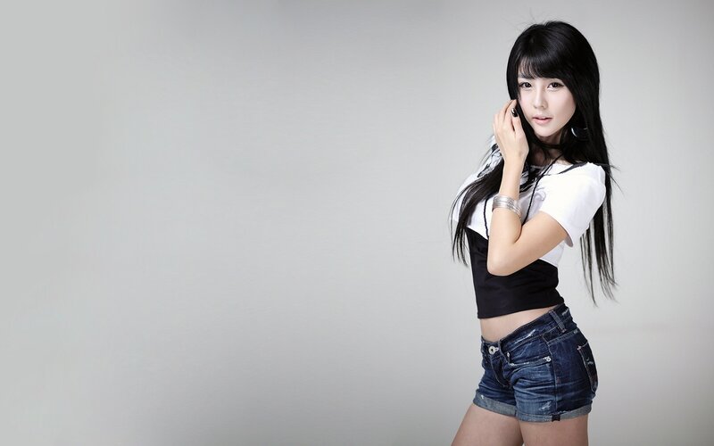 Woman in Denim Shorts — White, Neutral, Photograph, T-shirt