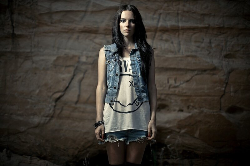 woman in denim vest