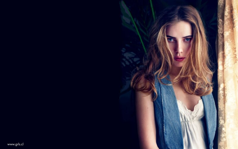 woman in denim vest