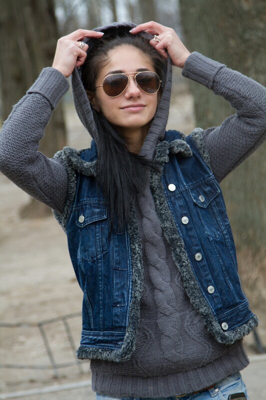 woman in denim vest