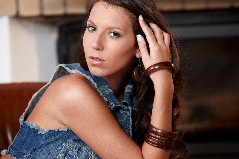 woman in denim vest