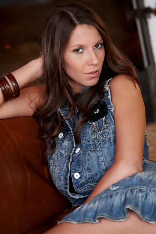 woman in denim vest
