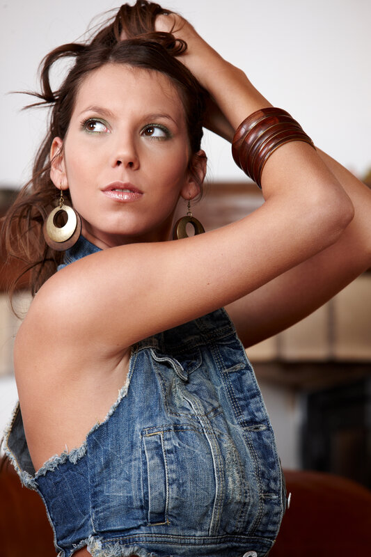 woman in denim vest