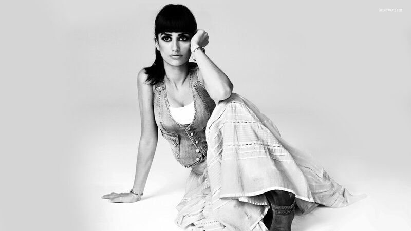 woman in denim vest posing