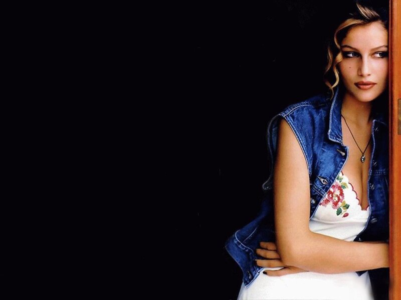 Woman in Denim Vest