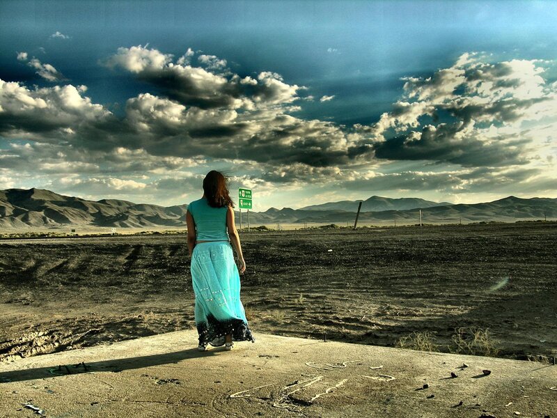 Woman in desert landscape
