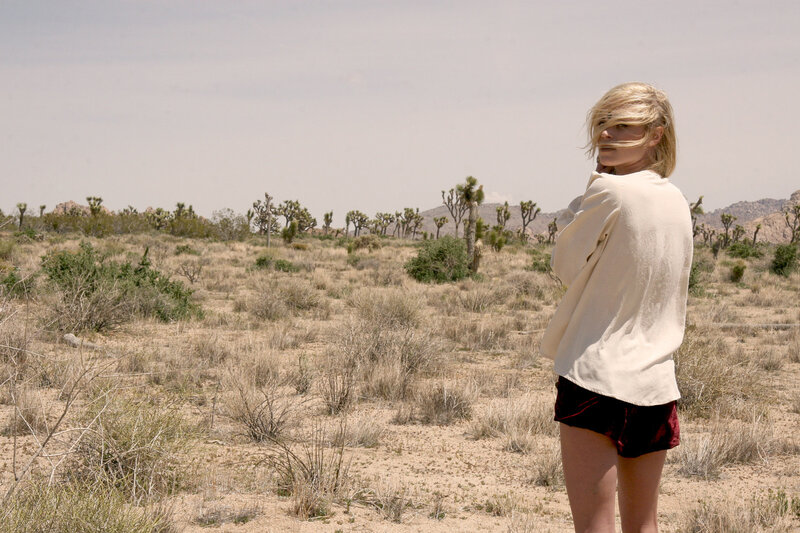 Woman in Desert Landscape — Beige