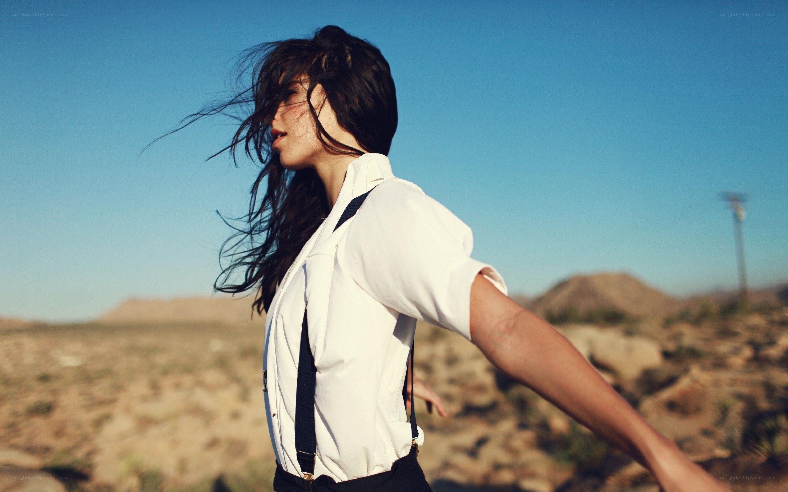 woman in desert wind