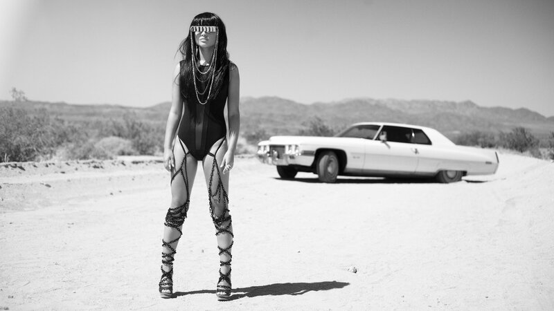 woman in desert with car