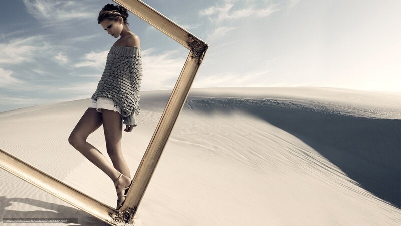 woman in desert with frame