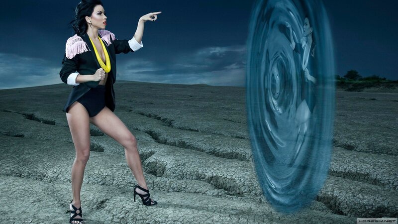 woman in desert with portal
