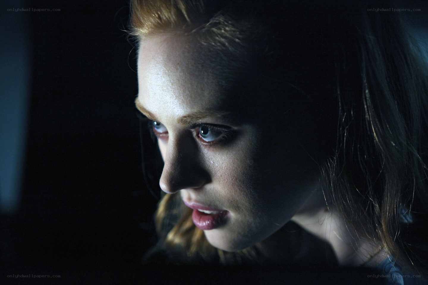 woman in dim light