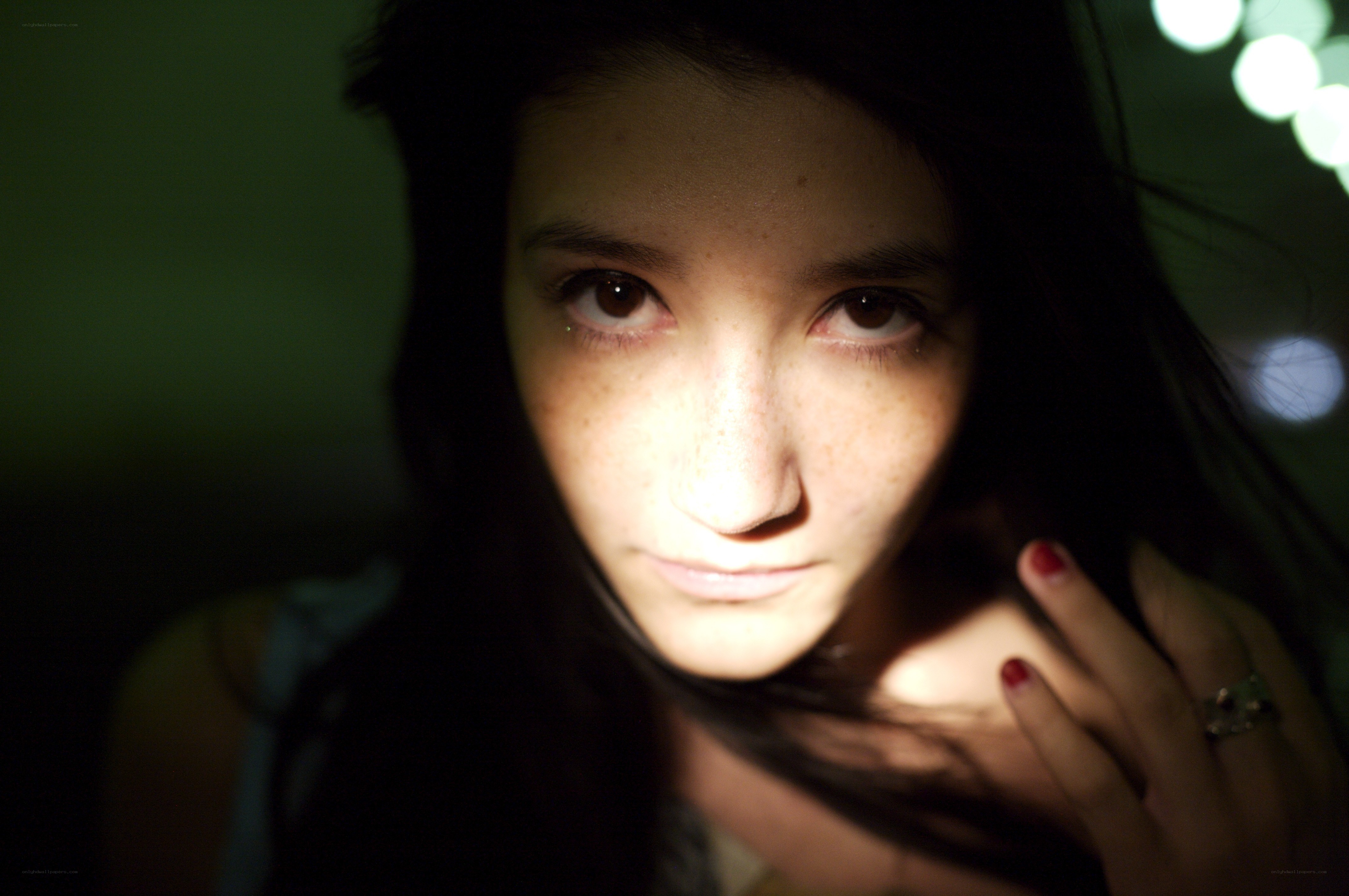 woman in dim light