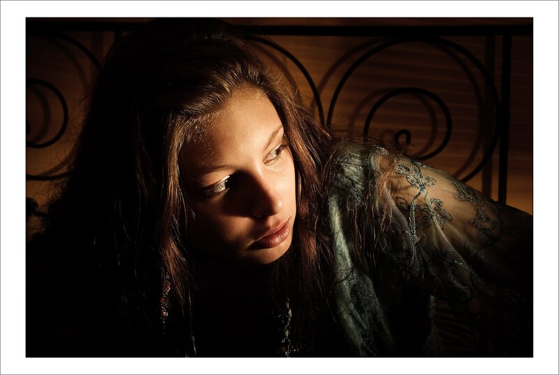 woman in dimly lit room