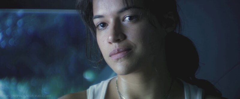 woman in dimly lit room