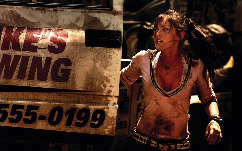 woman in dirty clothes near truck