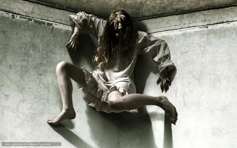 Woman in distress on concrete floor