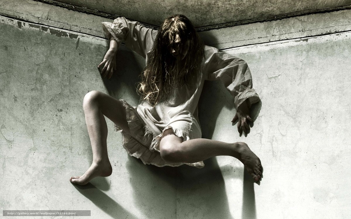 Woman in distress on concrete floor