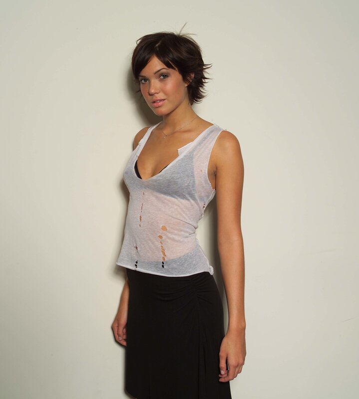 woman in distressed top
