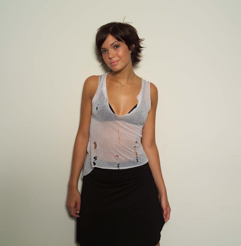 Woman in distressed top