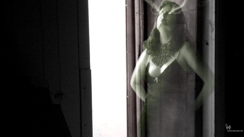 woman in doorway with smoke