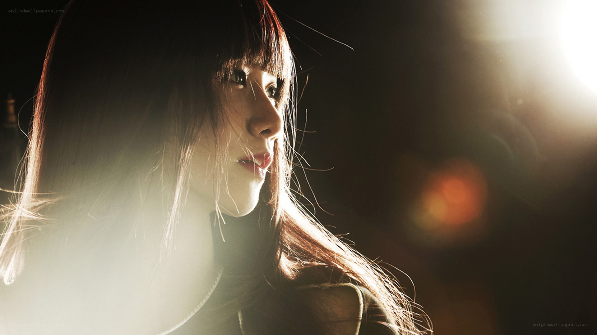 woman in dramatic backlight
