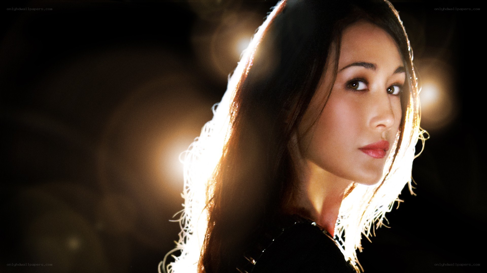 woman in dramatic lighting