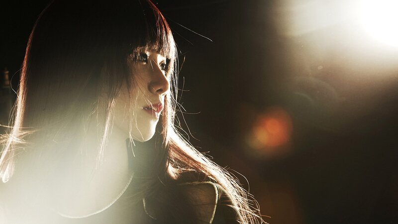 woman in dramatic lighting