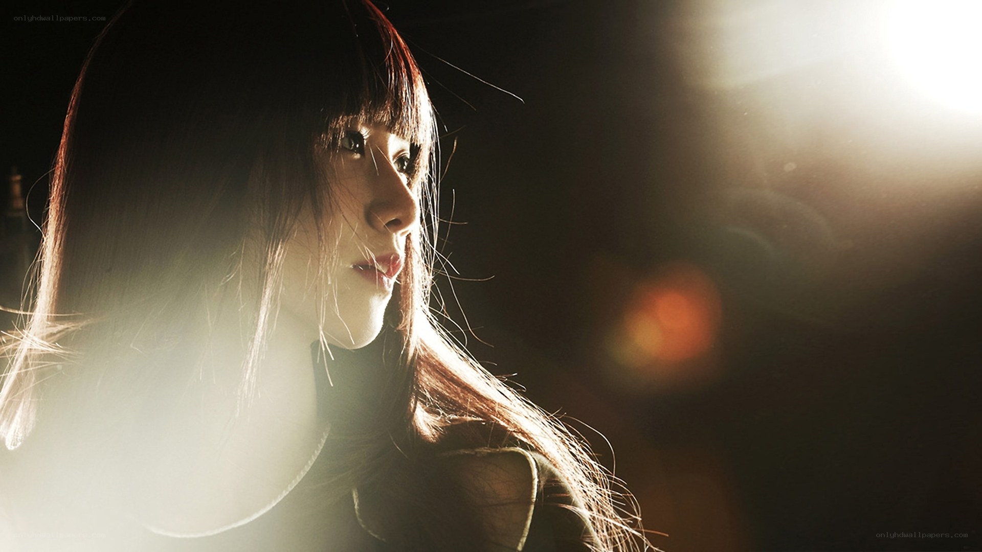 woman in dramatic lighting