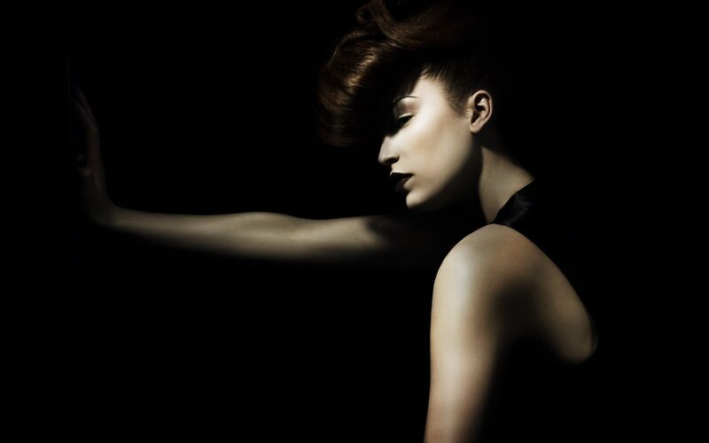 woman in dramatic lighting