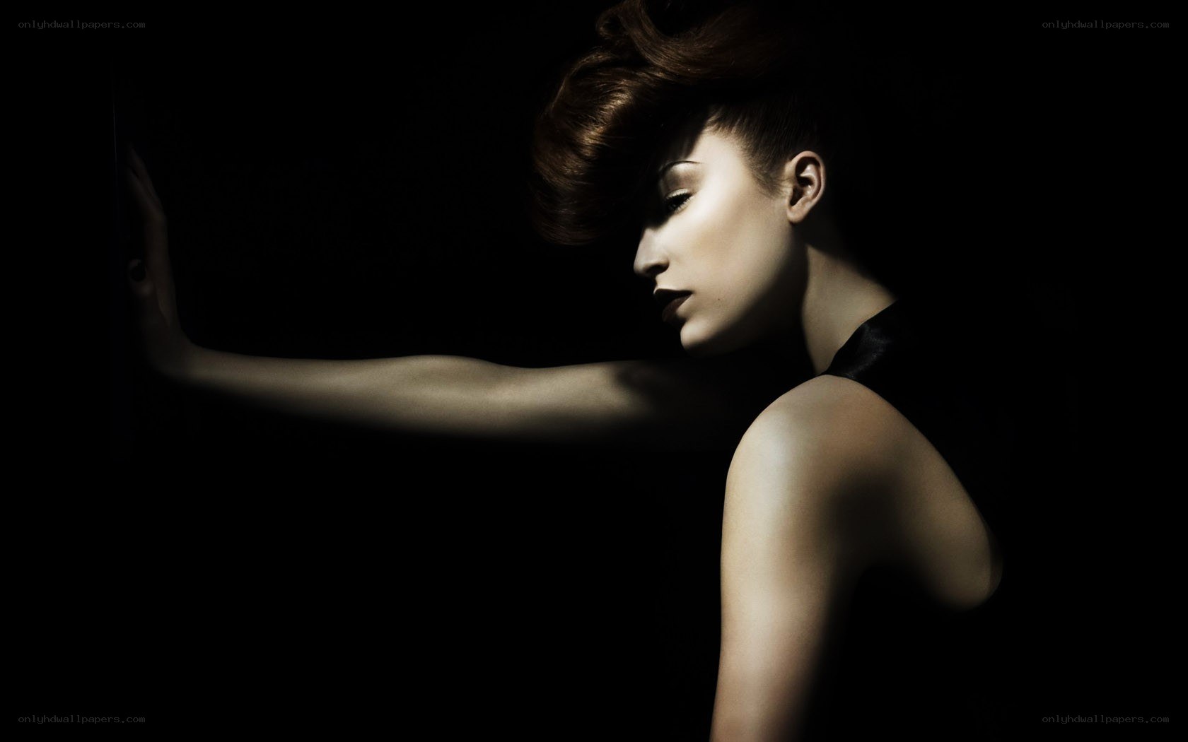 woman in dramatic lighting