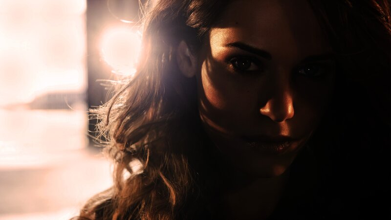 woman in dramatic lighting
