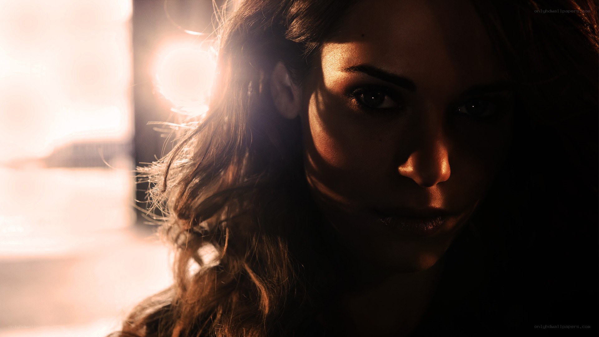 woman in dramatic lighting