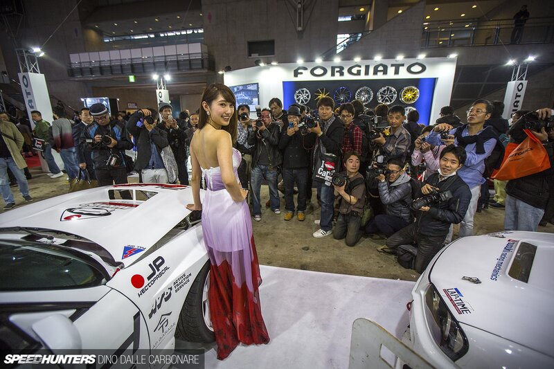 Woman in Dress at Car Show — White
