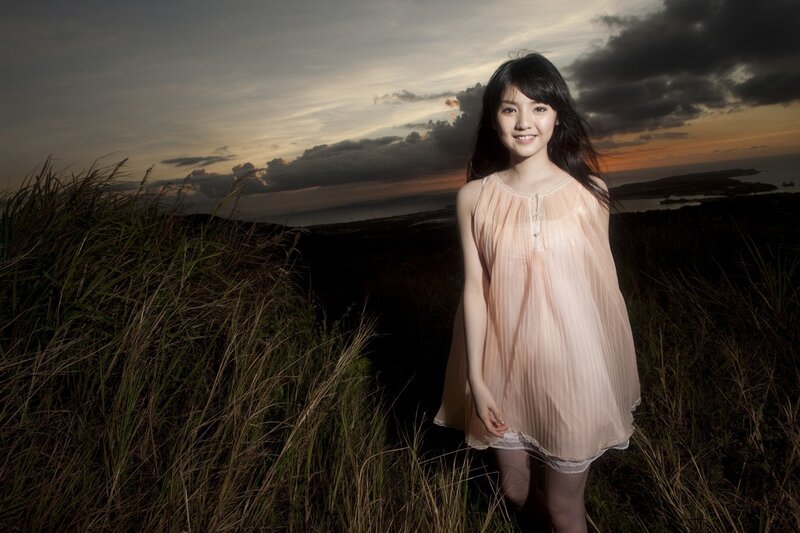 Woman in dress at sunset