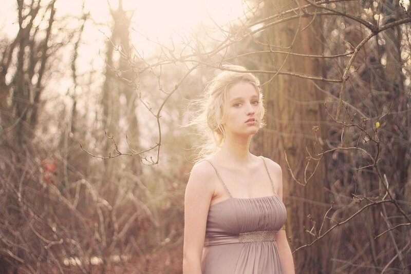 woman in dress in forest