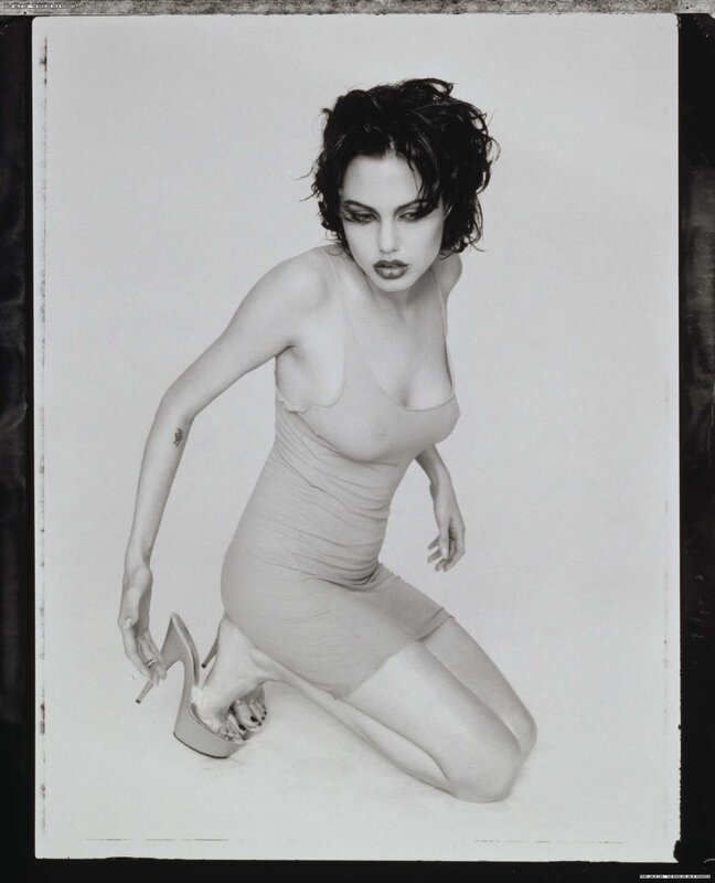 woman in dress kneeling
